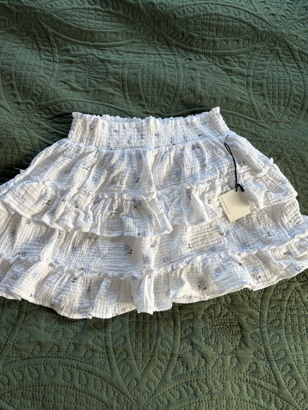 White Ruffled Smocked Mini Skirt with Delicate Floral Print